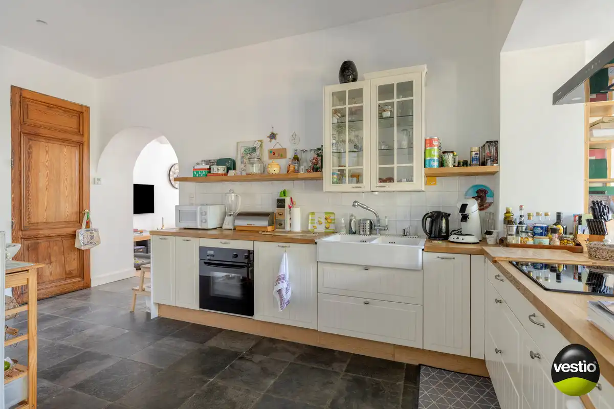 OPBRENGSTEIGENDOM VAN BUREEL, WONING, MAGAZIJN EN 2 APPARTEMENTEN TONGEREN LANGS N79. foto 10
