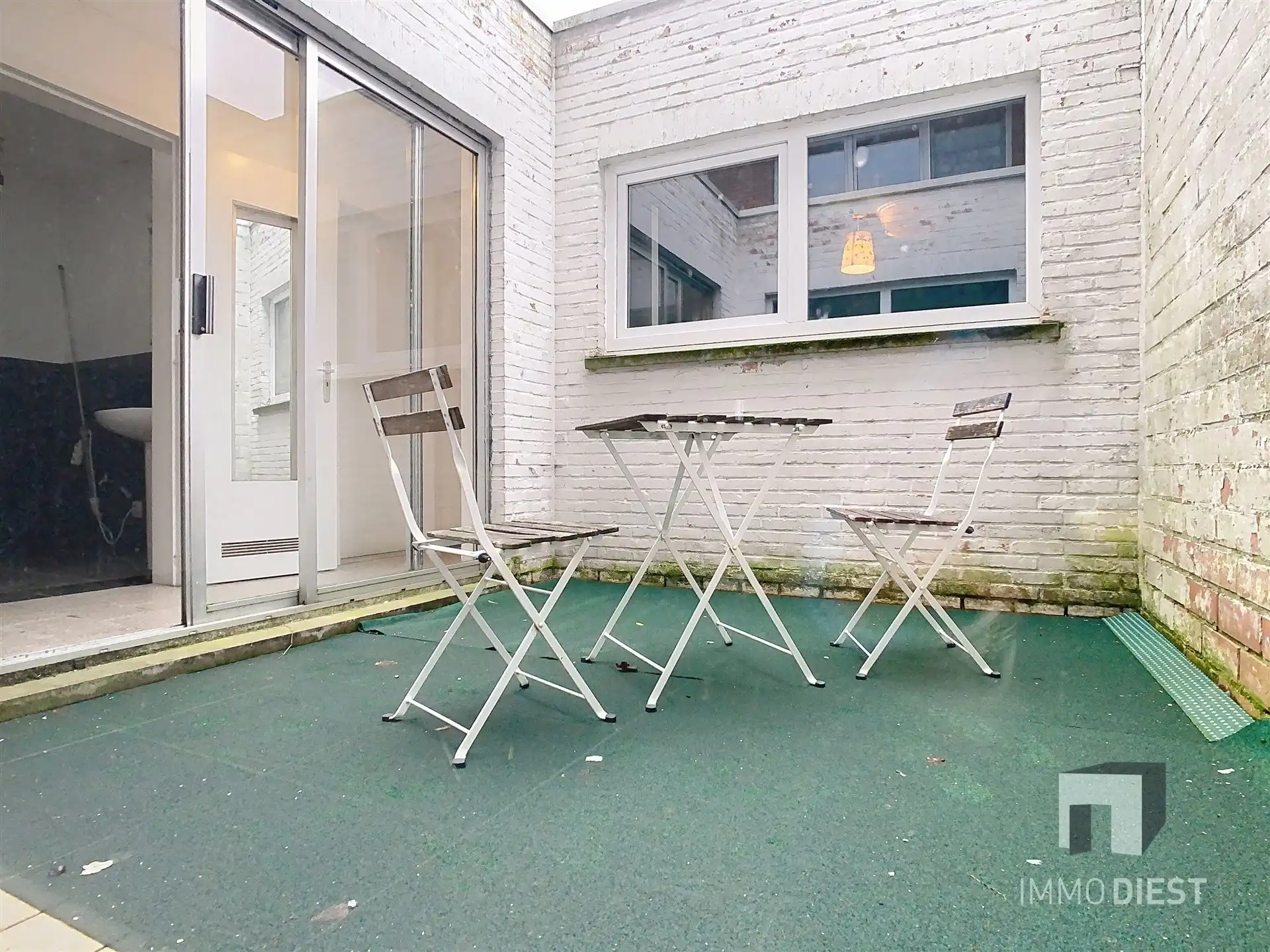 Handelsgelijkvloers met achterliggend appartement foto 12