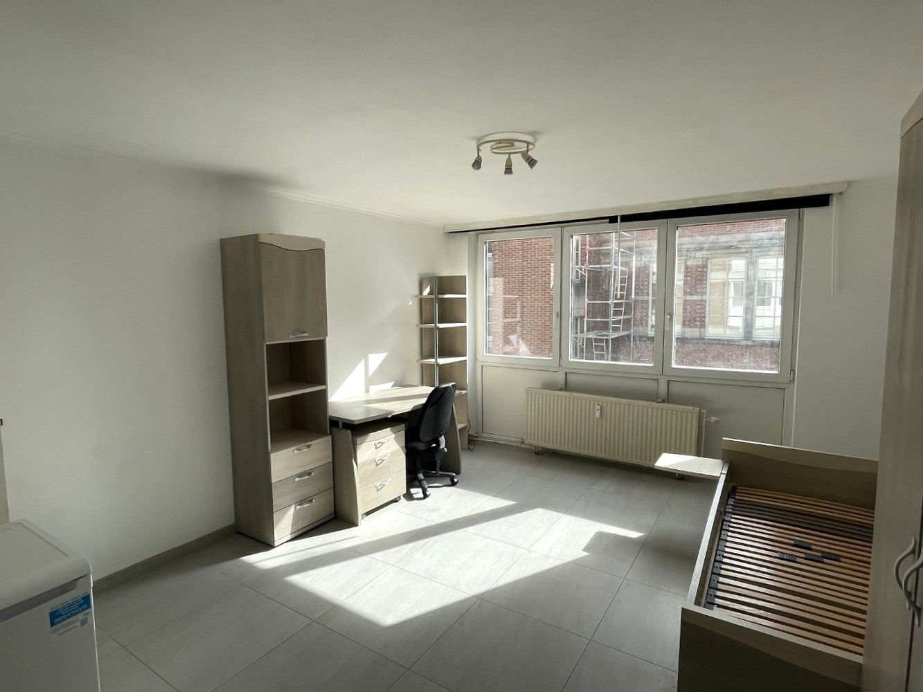 Welgelegen studio nabij centrum Leuven en diverse campussen foto {{pictureIndex}}