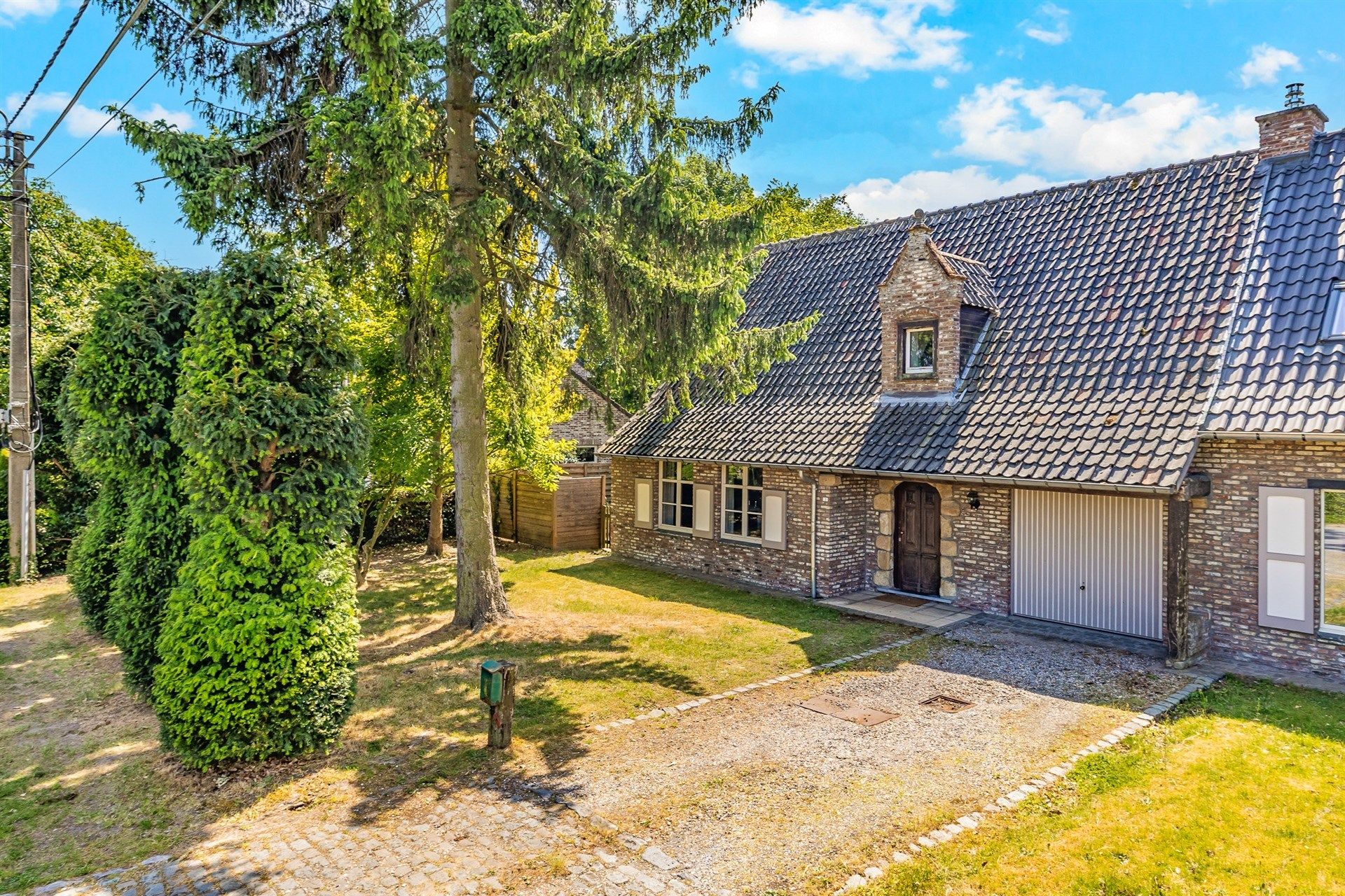 Charmante woning met 3 slks en zonnige tuin op topligging foto {{pictureIndex}}
