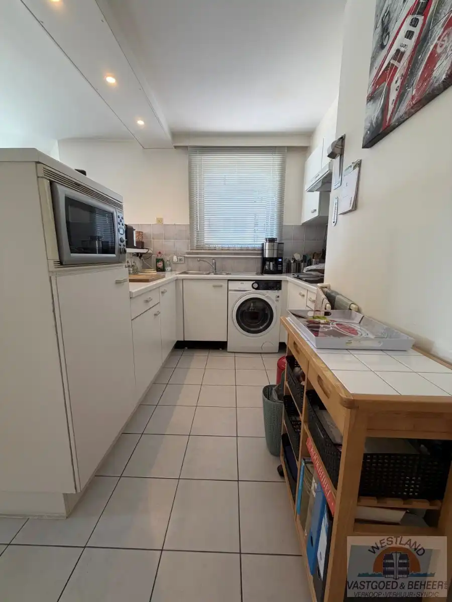 Lichtrijk hoekappartement met 1 slaapkamer foto 2