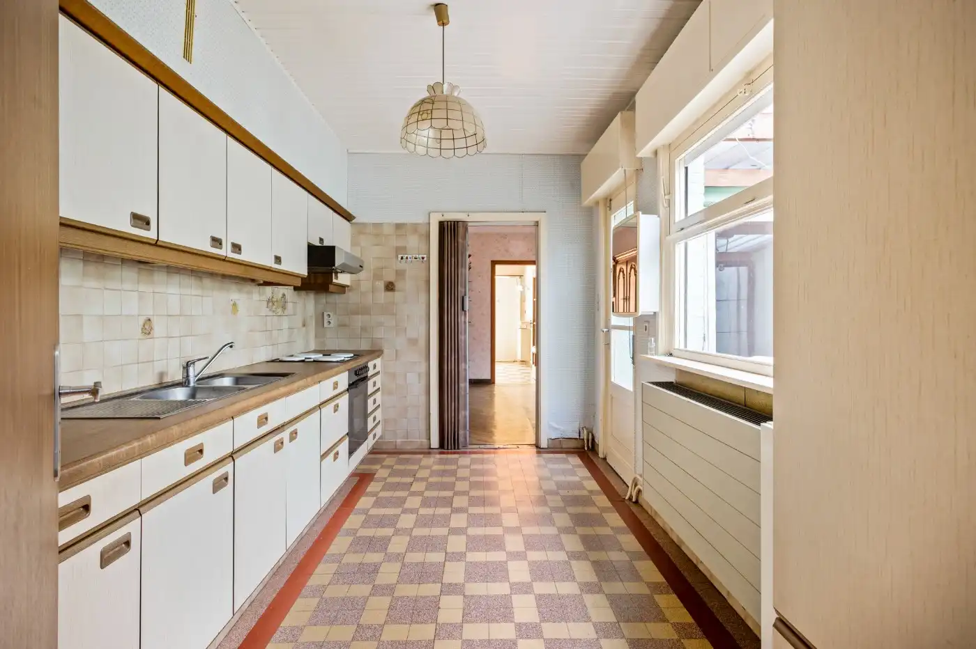 Te renoveren woning met 3 à 4 slpk. en inpandige garage foto 7