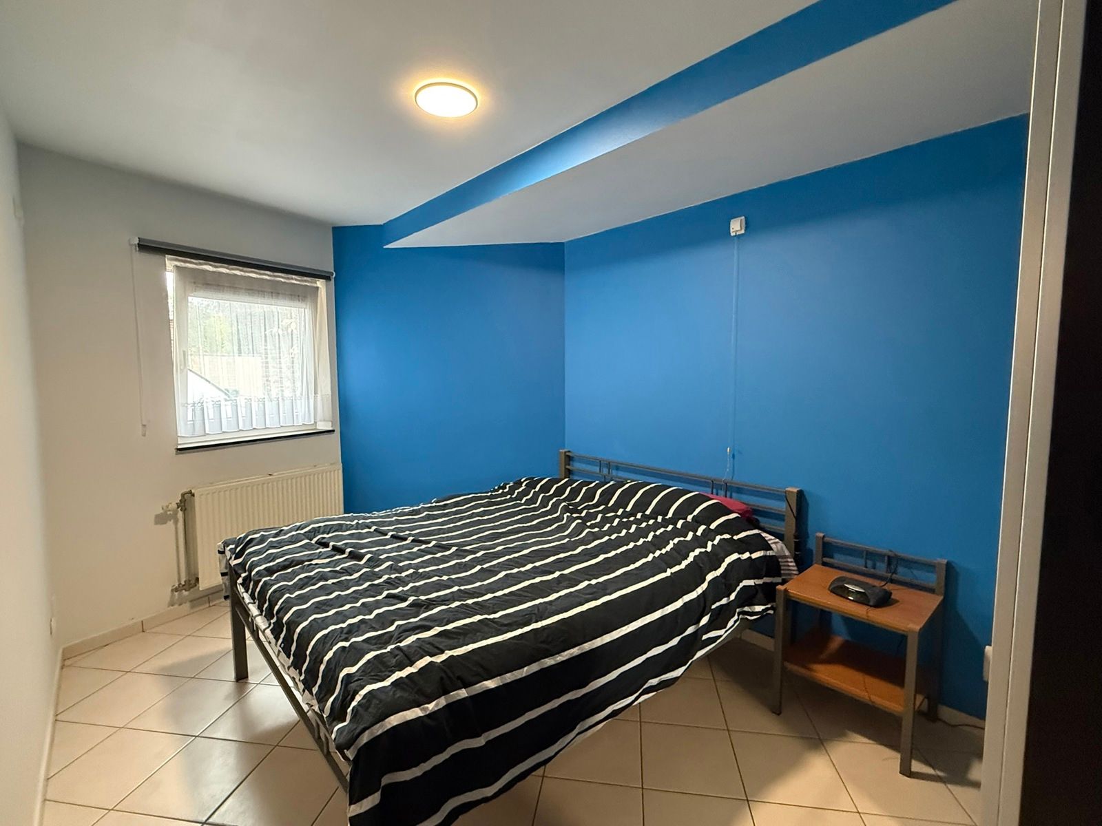 GELIJKVLOERSAPPARTEMENT MET TERRAS EN GARAGE IN HET CENTRUM VAN TIELT.  foto 8