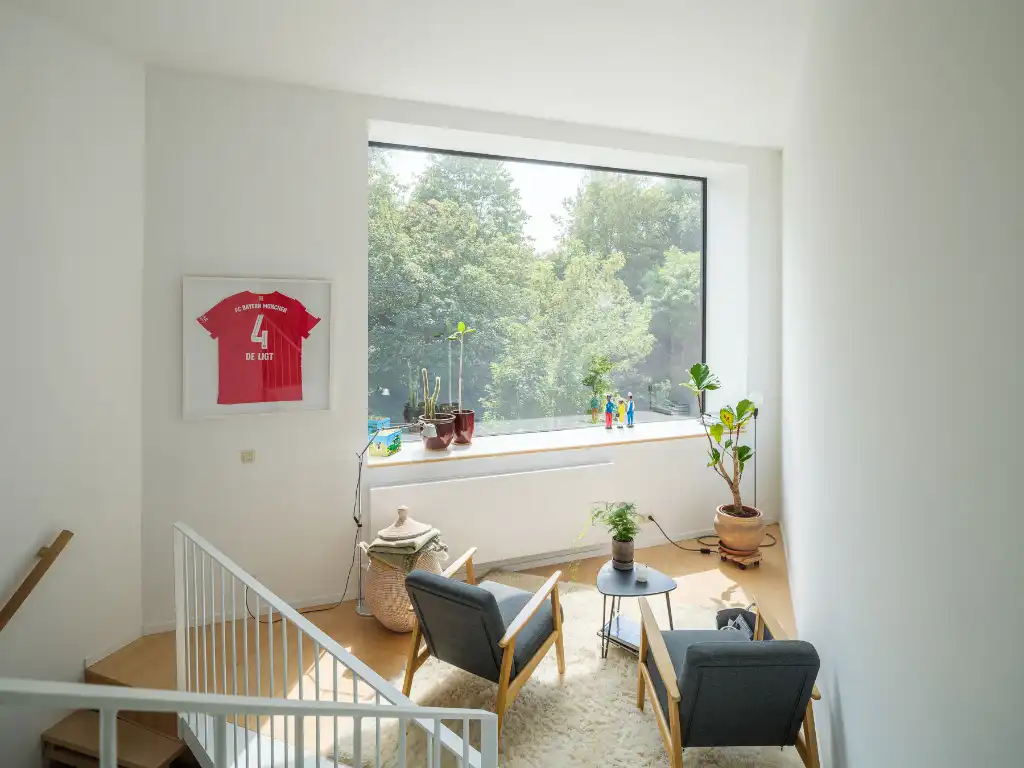 Architecturale gezinswoning met drie slaapkamers, zicht op water en groen, vlak bij de Coupure. foto 9