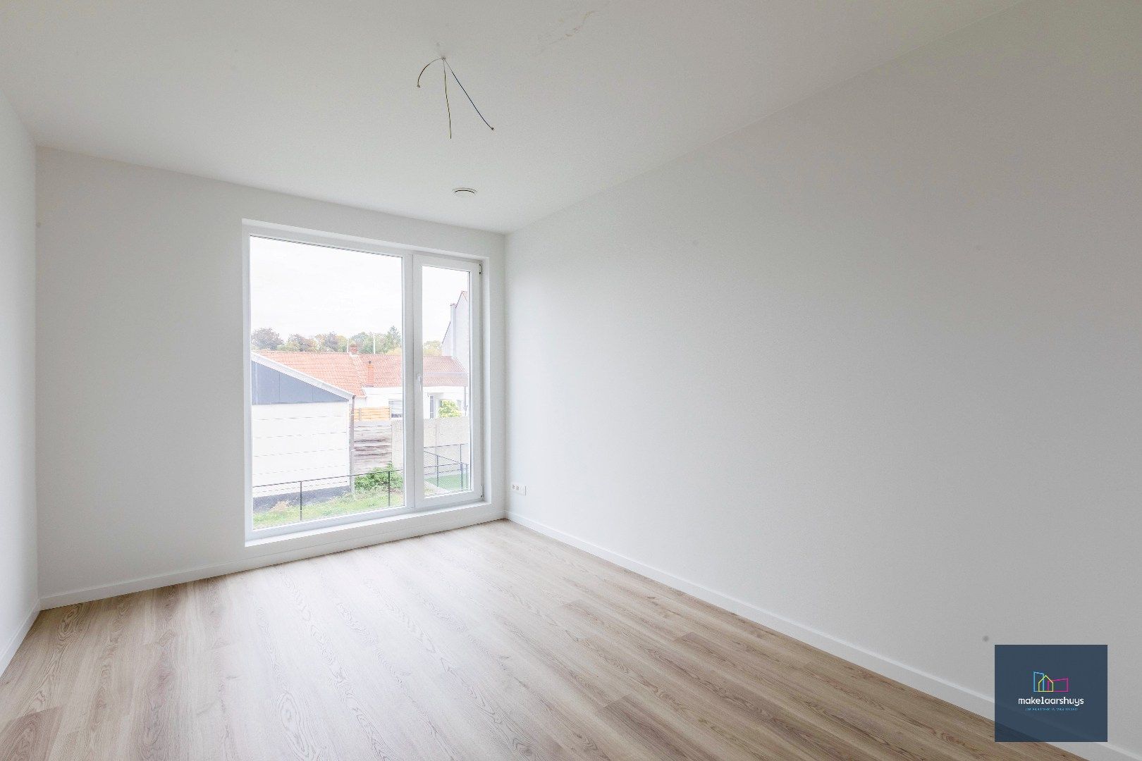 Energiezuinige nieuwbouwwoning met 3 slaapkamers , tuin en staanplaats foto 18