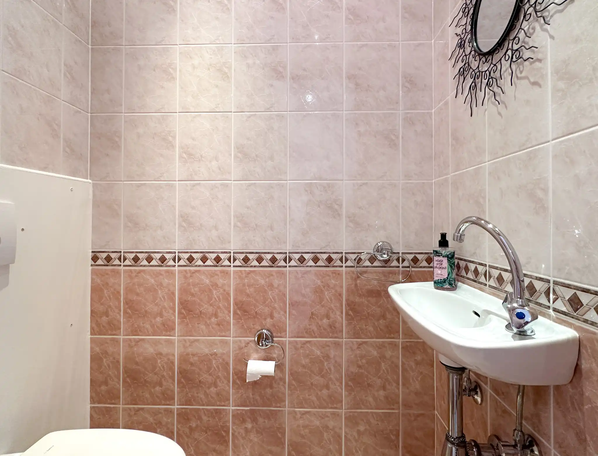 Woning met twee slaapkamers, dressing, garage en tuin te huur in het hartje van Melsele foto 4