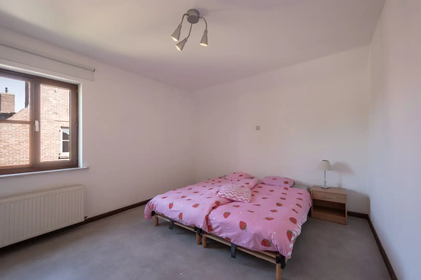 Ruime woning met 5 slaapkamers en toffe tuin! foto 9