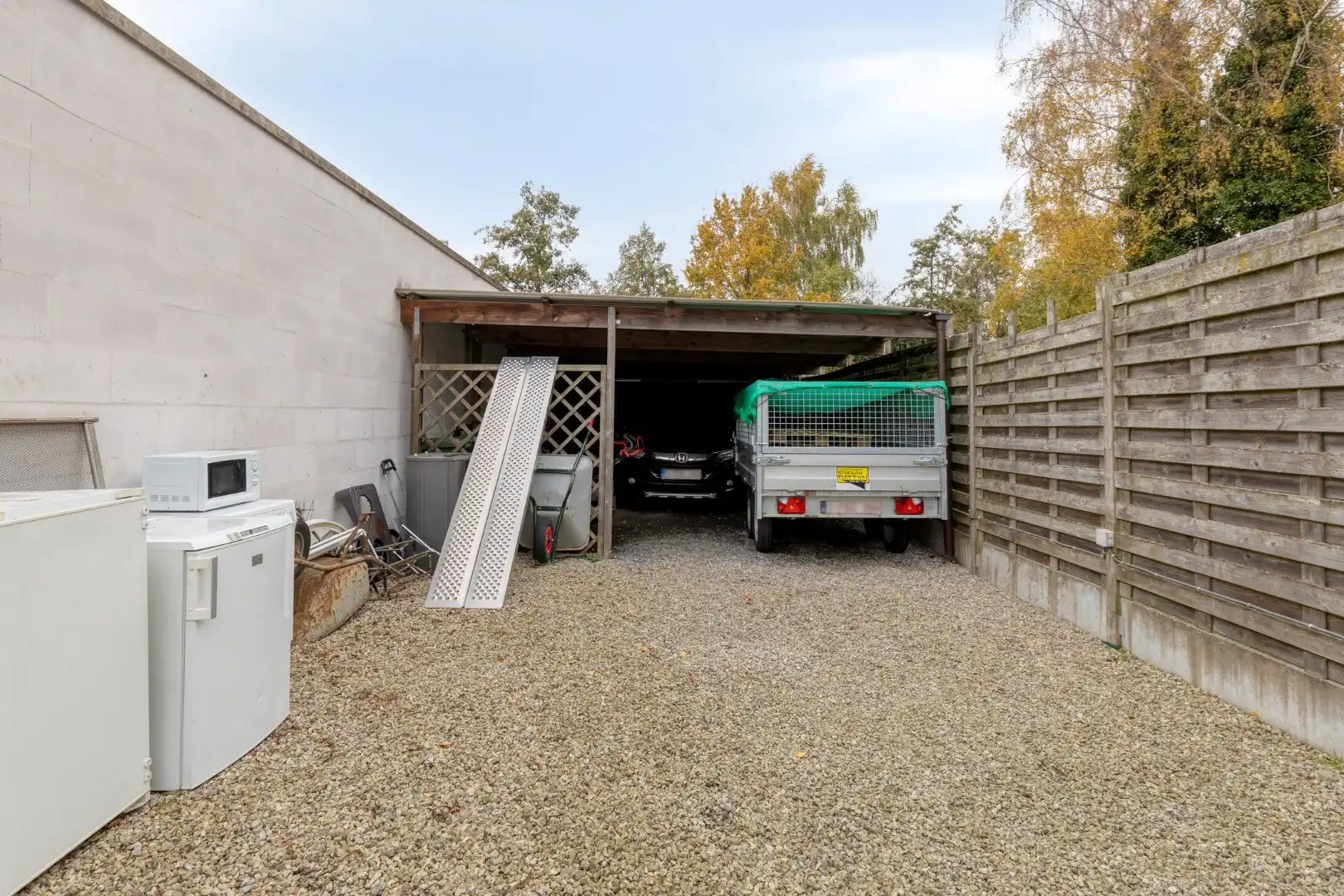 Verzorgde woning met diepe tuin, carport én uitweg! foto 21