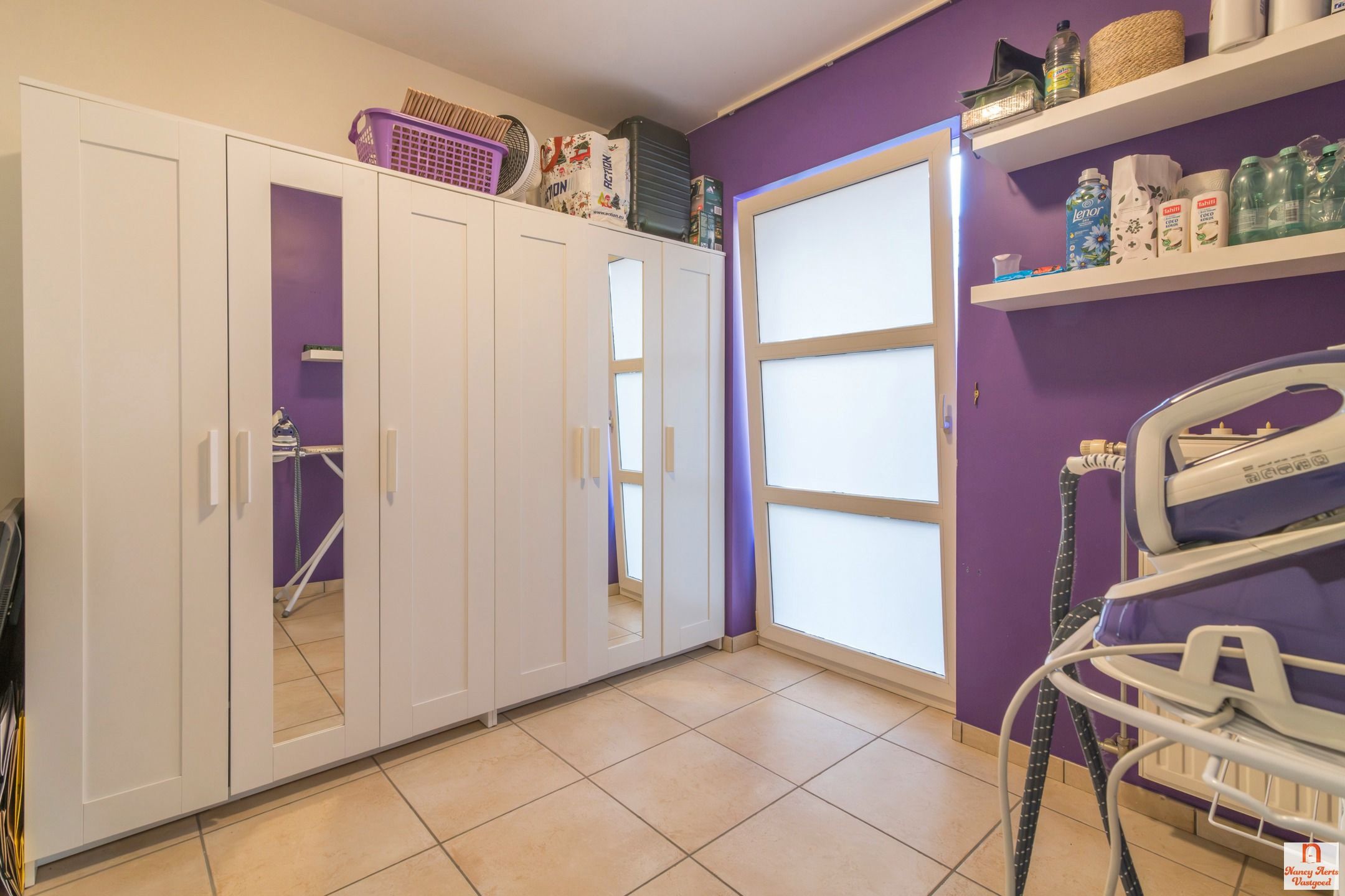 Lichtrijk gelijkvloers appartement met tuinzicht in Kuringen foto 21