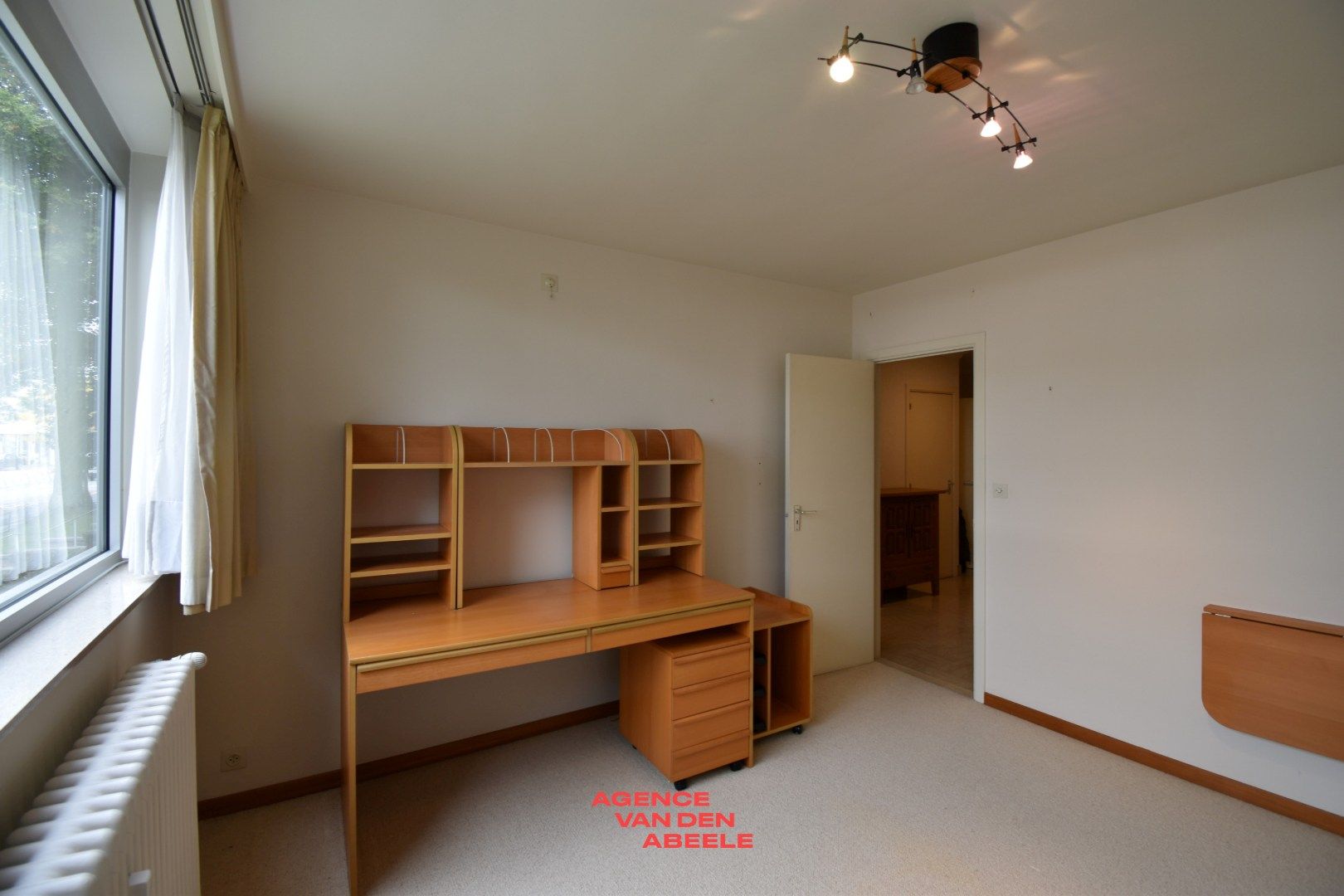 Stijlvol gelijkvloers appartement met royaal terras en boszicht foto 13