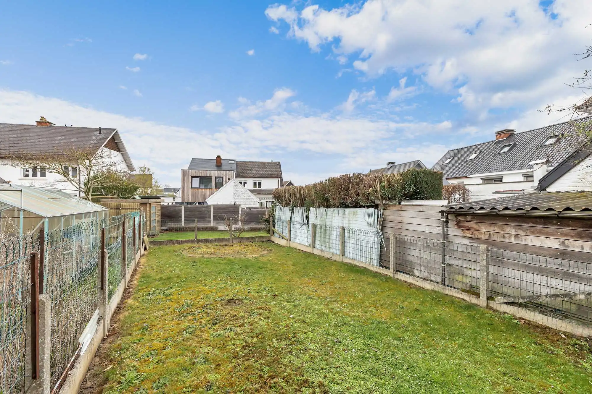 Halfopen bebouwing met garage en tuin in Ternat! foto 4