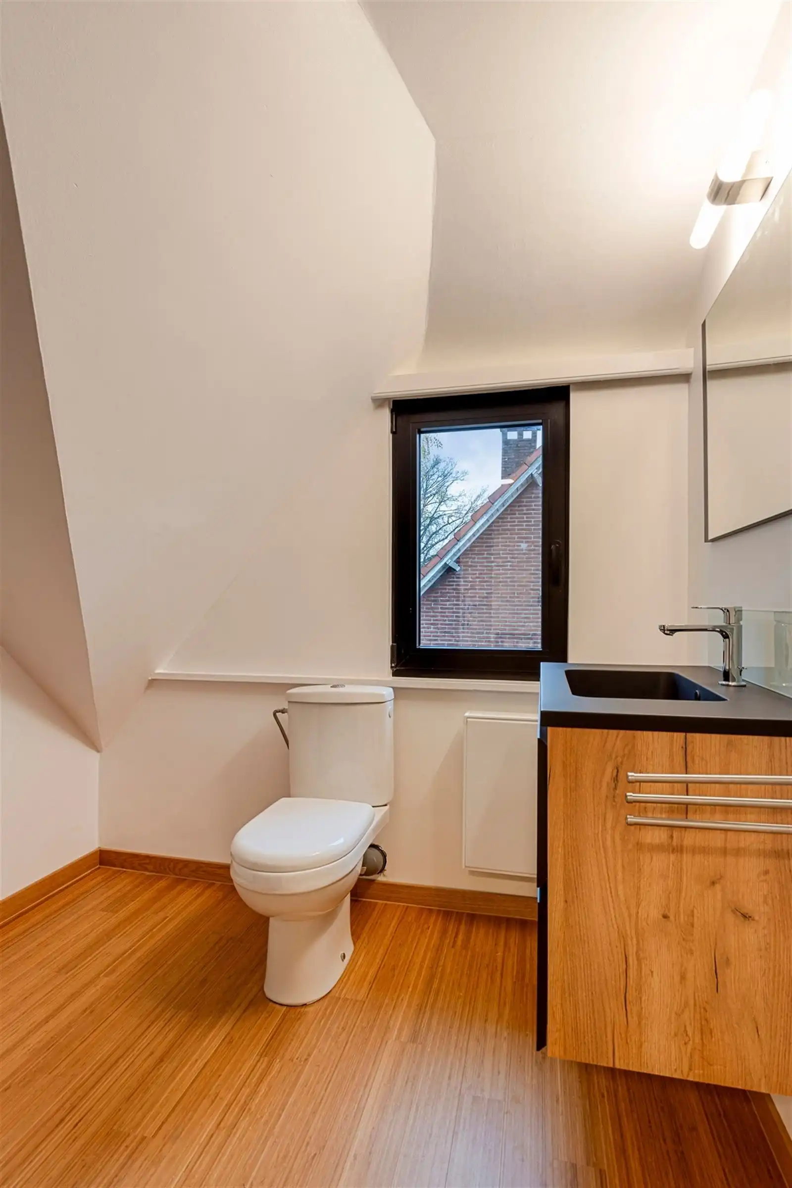 ELSDONK: Rustige, praktische woning met een uitgesproken familiaal karakter. foto 18