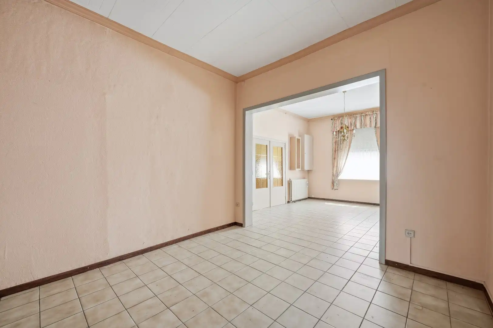 Te renoveren rijwoning in Attenhoven met tuin, garage en 3 slaapkamers foto 8