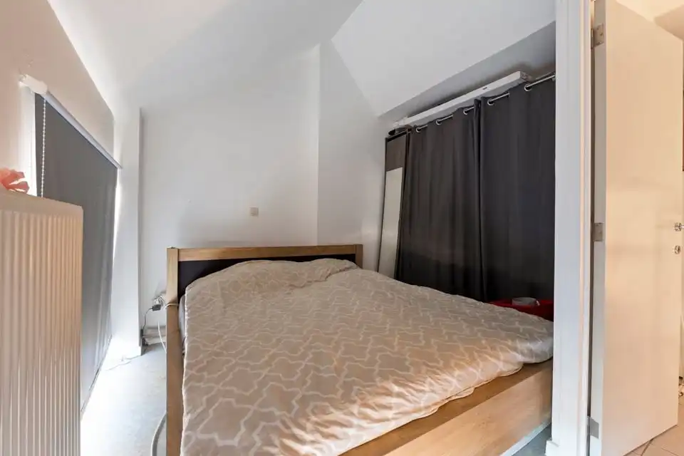 KNAP HANDELSPAND MET TWEE APART VERHUURDE APPARTEMENTEN IN HET CENTRUM VAN SINT-TRUIDEN foto 32