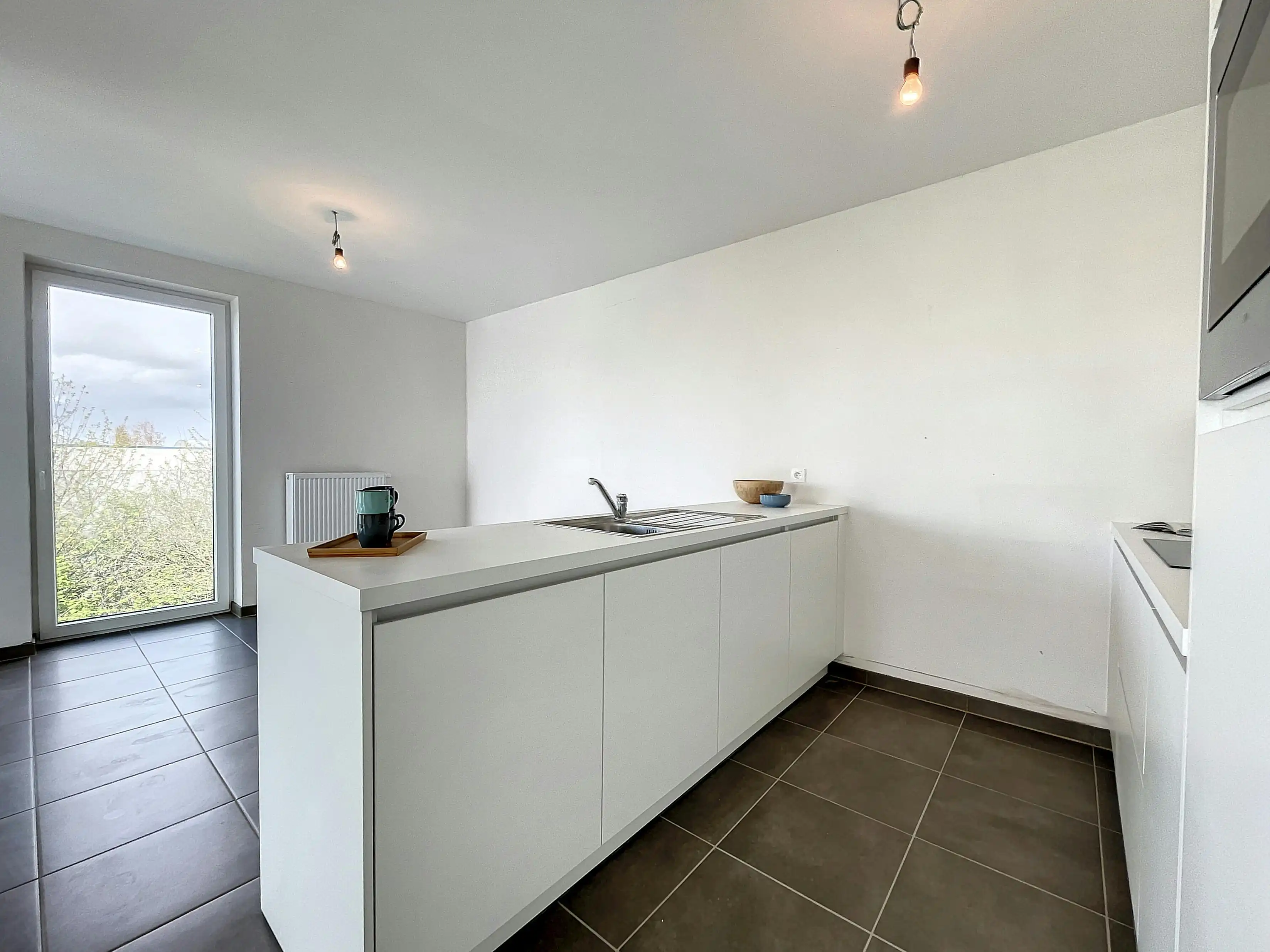 Modern 2-slaapkamerappartement met ruim terras en garagebox foto 4