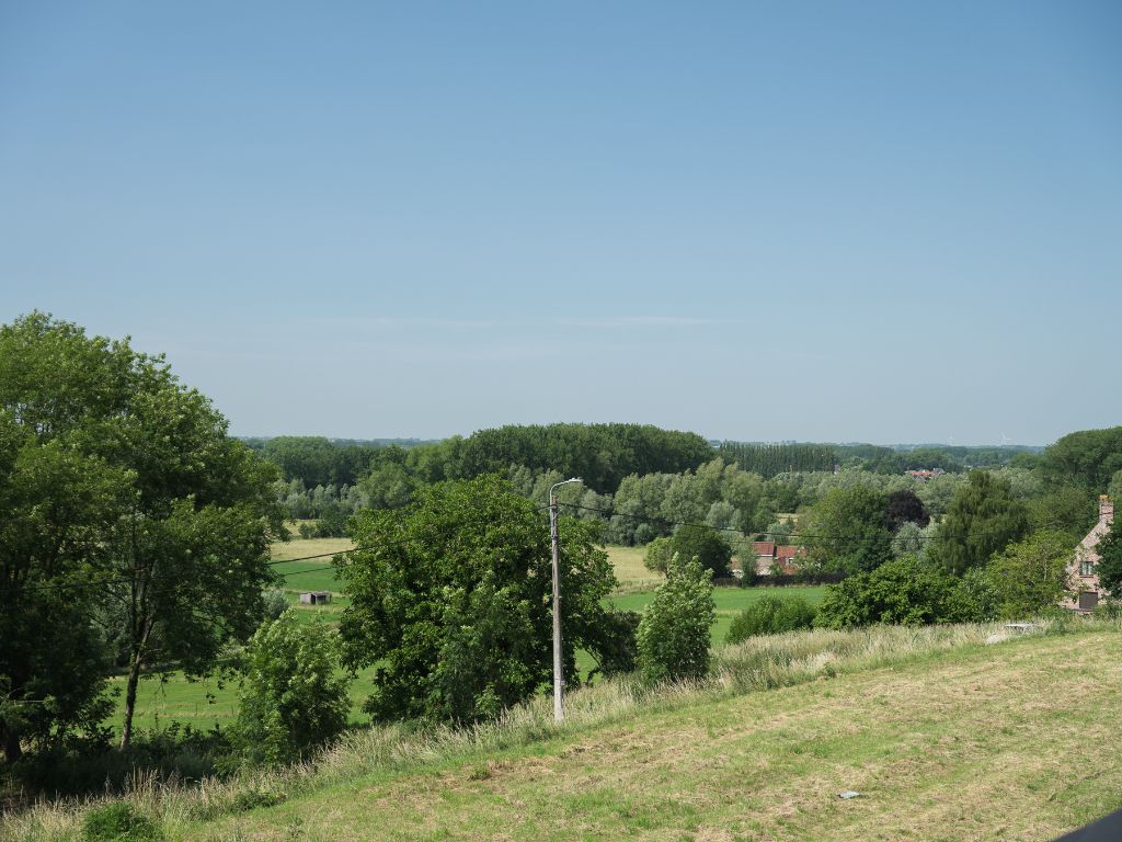 Architecturale casco-nieuwbouw bestaande uit een uitzonderlijke stapelwoning met onderliggende garage en adembenemende zichten over de Scheldevallei. foto 19