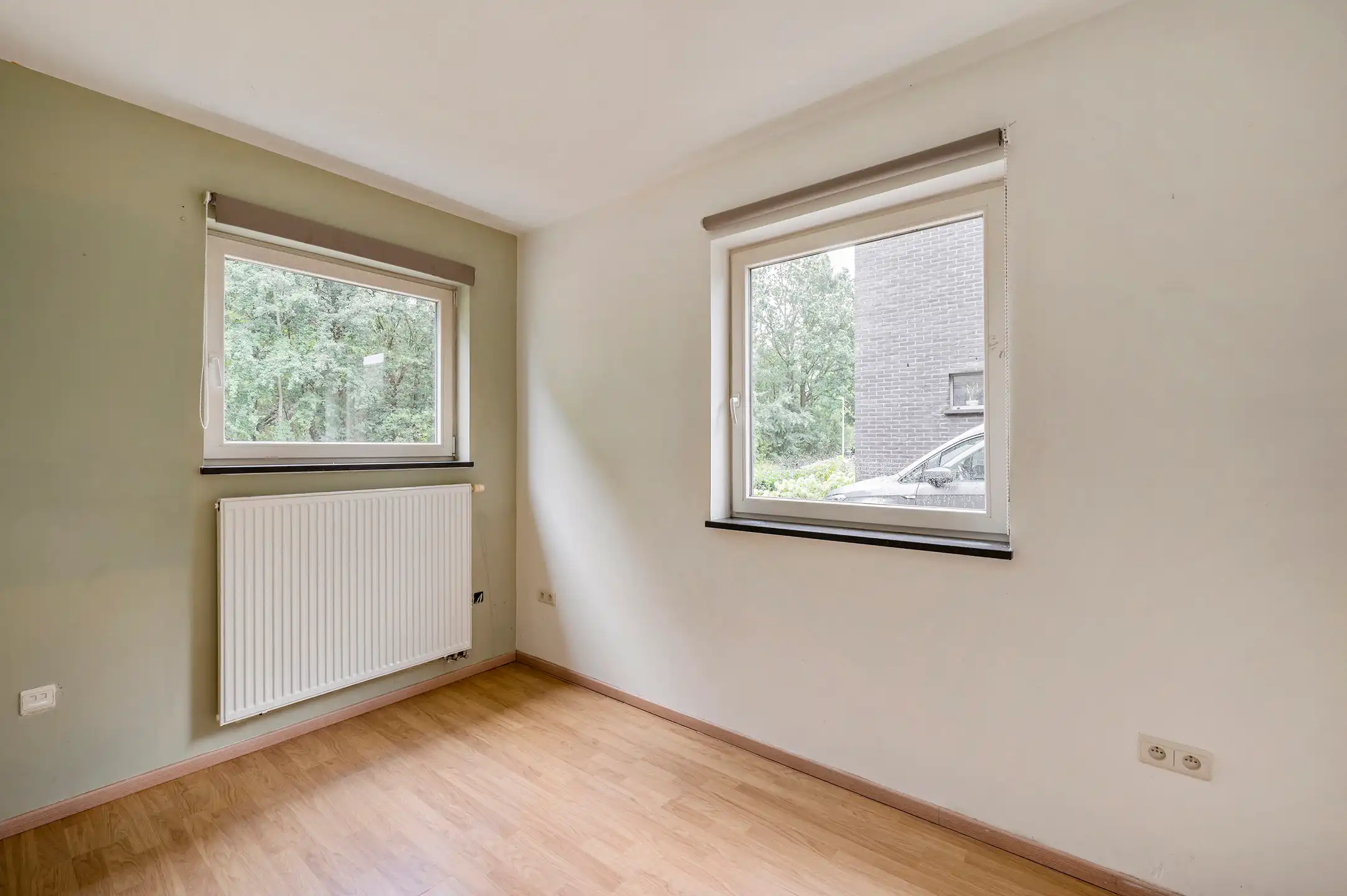 Ruime en lichtrijke gezinswoning met 3 slaapkamers, dressing bureau en aangename tuin foto 21