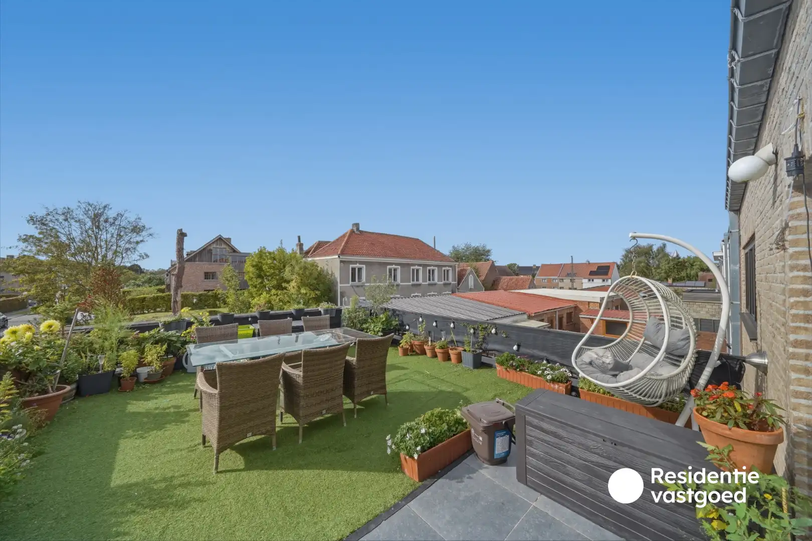 Opbrengsteigendom met 3 appartementen, garage en zonnig terras foto 7
