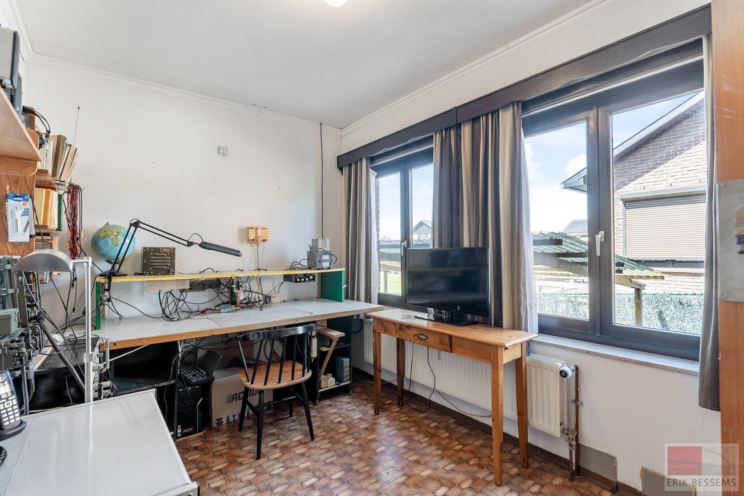 Vrijstaande woning uit 1981 op een ruim perceel in Rekem. Woonopp. 120 m² en perceel 1180 m². foto 17
