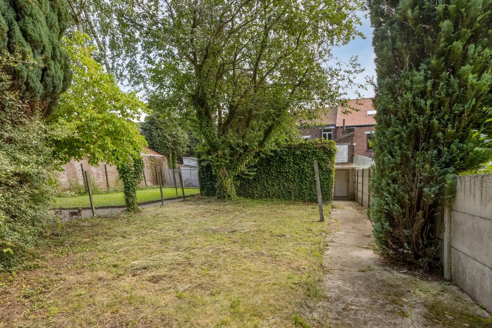 Ruime te renoveren woning met 3 slaapkamers in Lubbeek met doorgang langs het perceel van de buren. EPC: 736 KWH/m² foto 34