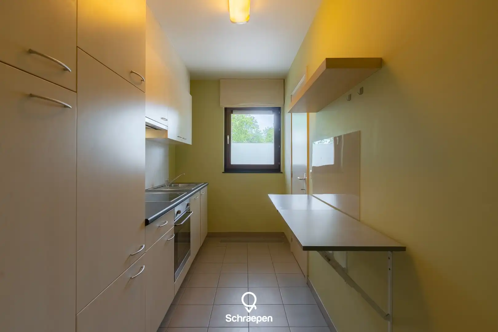 Gelijkvloers appartement met 1 slpk én overdekt terras te Hasselt! foto 8