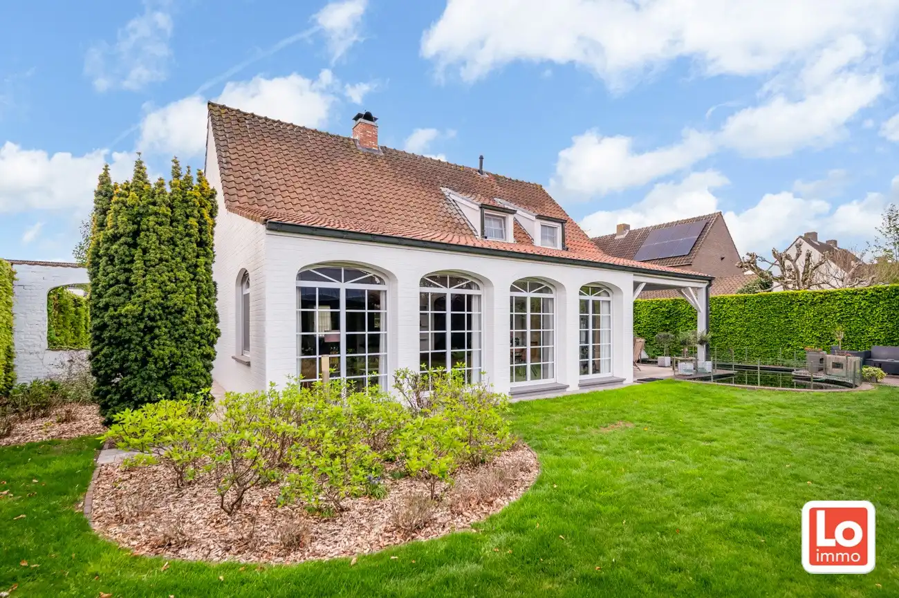 VERKOCHT! Charmante alleenstaande woning met inpandige garage op een zeer goede locatie in Oostakker. foto 4