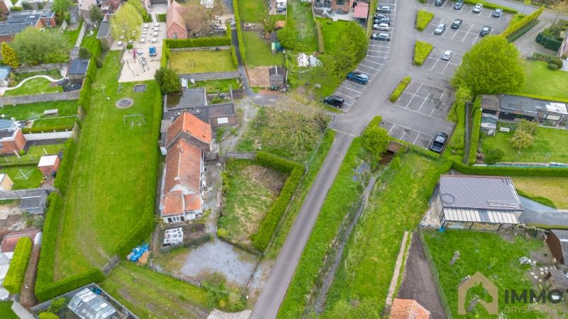 Te koop te Hulste : grond met  2 te slopen woningen +/- 1348 m². foto 6