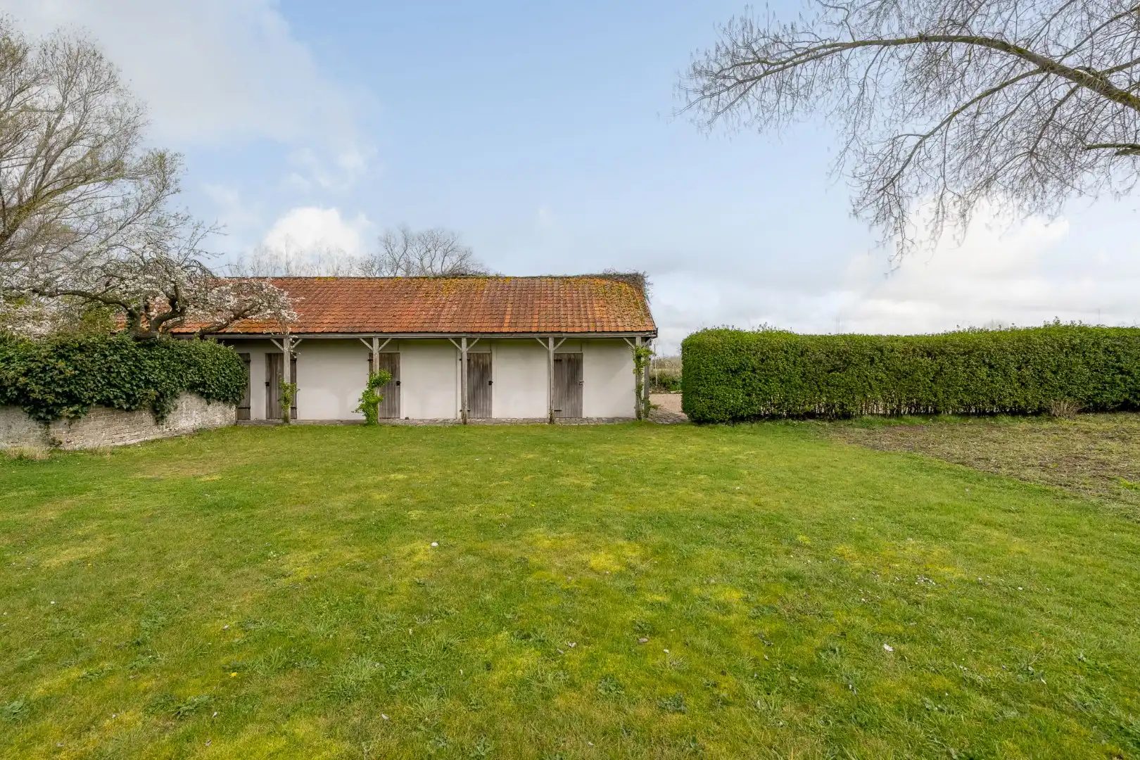 Exclusieve karaktervolle woning op een enorm perceel met 4 slaapkamers, super grote tuin met prachtig zicht op de polders foto 23