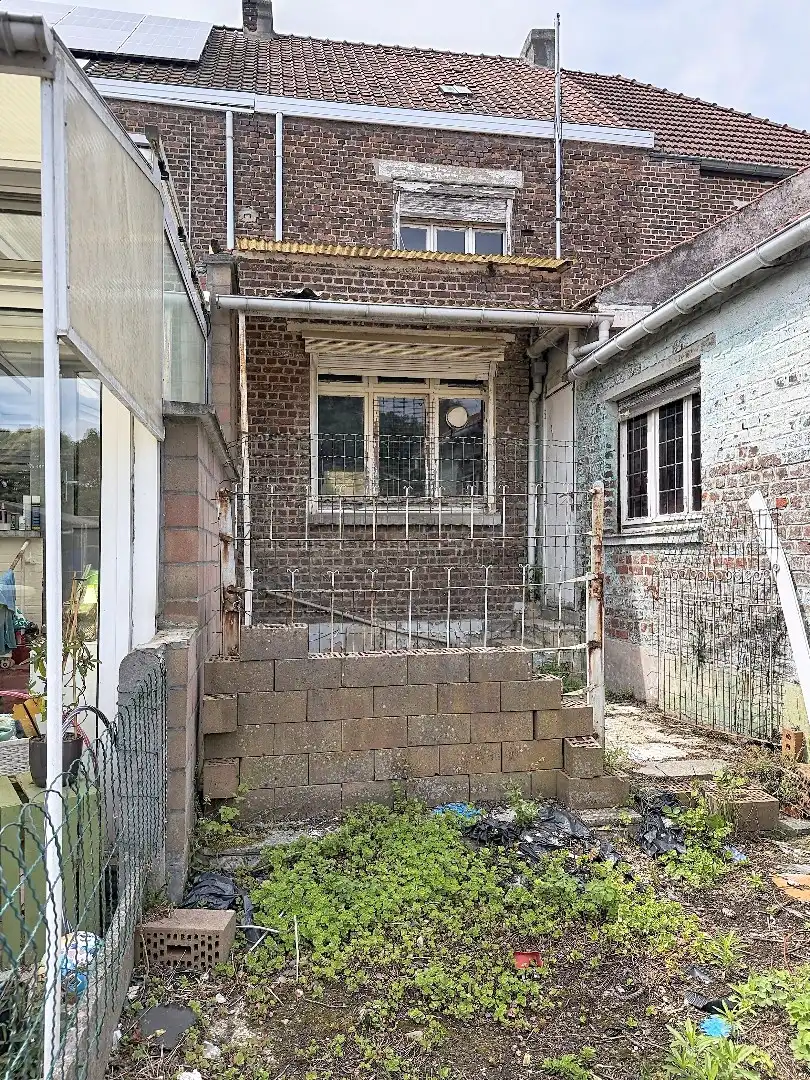 Te renoveren gezinswoning met ruime tuin in Tienen foto 14