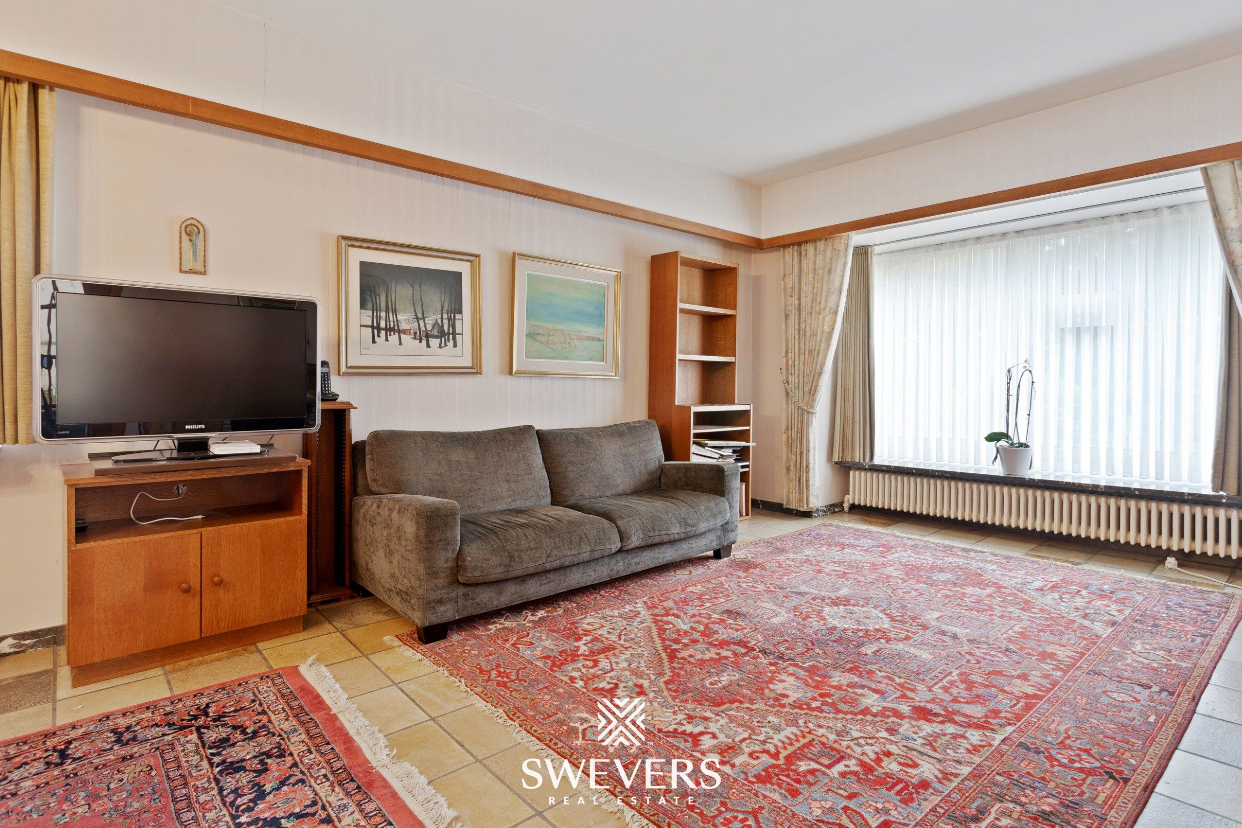 Open bebouwing met 4 slaapkamers, kelder en tuin in rustige, doodlopende straat foto 2