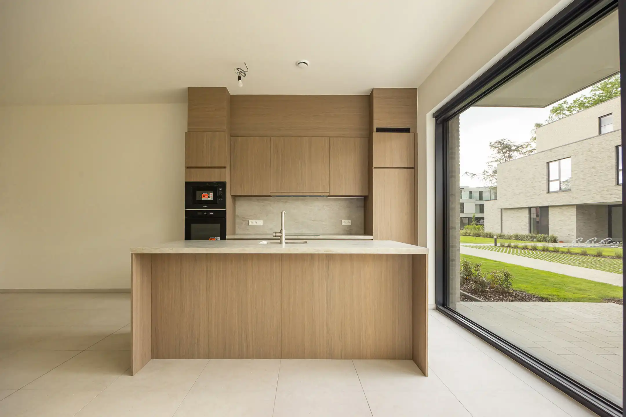 Ruim gelijkvloers nieuwbouwappartement met 3 slaapkamers foto 4