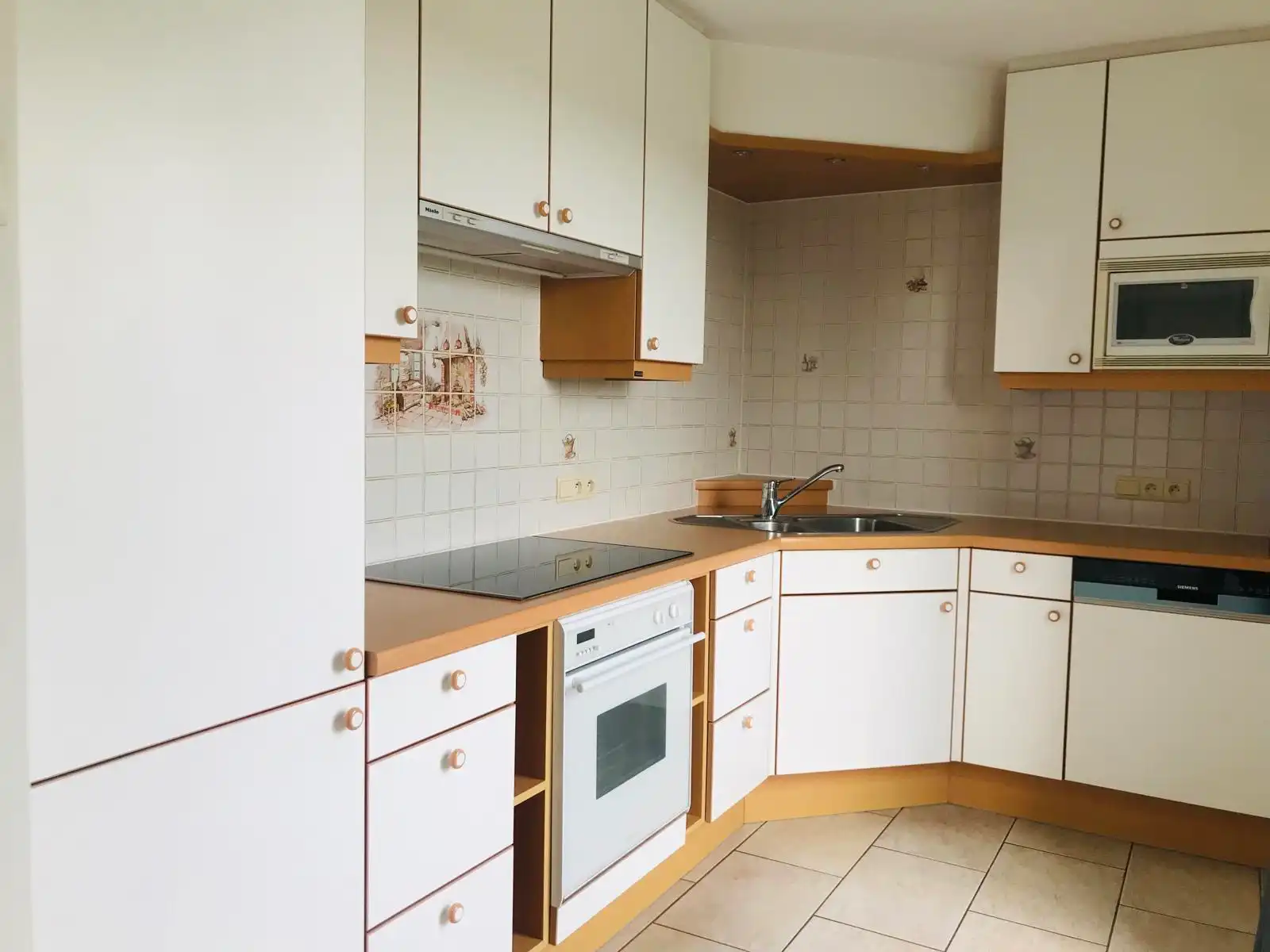 Mooi appartement nabij centrum Tienen met 2 slpks en garage. foto 5