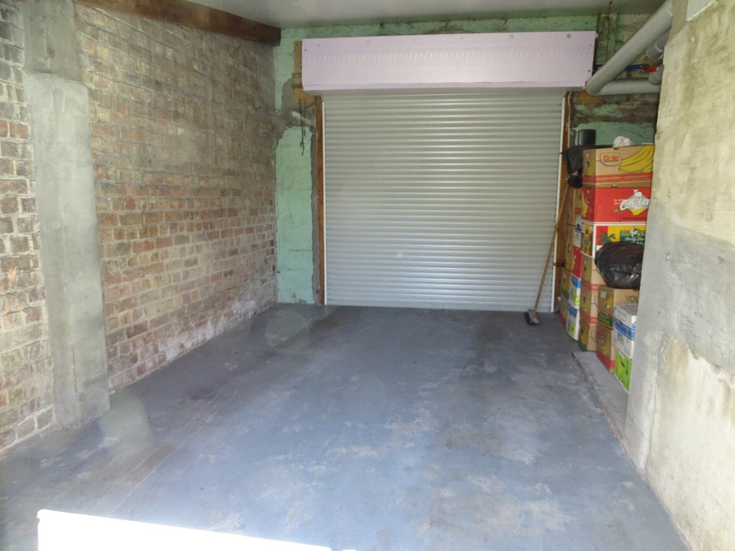 Te renoveren woonst met leuke tuin en garage foto 9