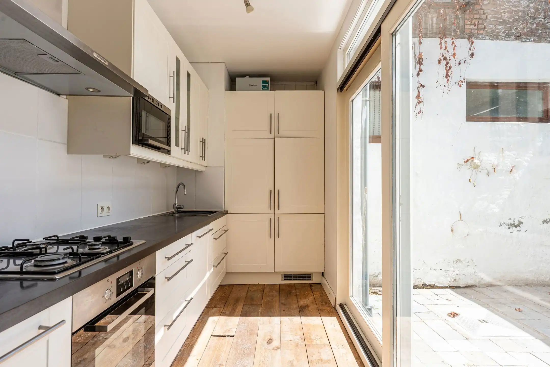 Authentieke stadswoning met 4 slaapkamers en ruime koer nabij Gent foto 6