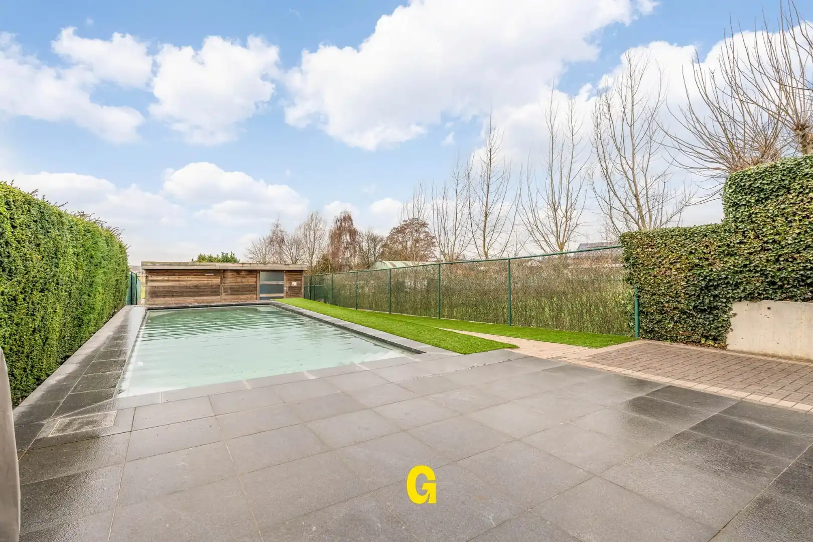 Knappe halfopen woning met zuidwest gerichte tuin met zwembad, rustig gelegen te Kleine Spouwen foto 26