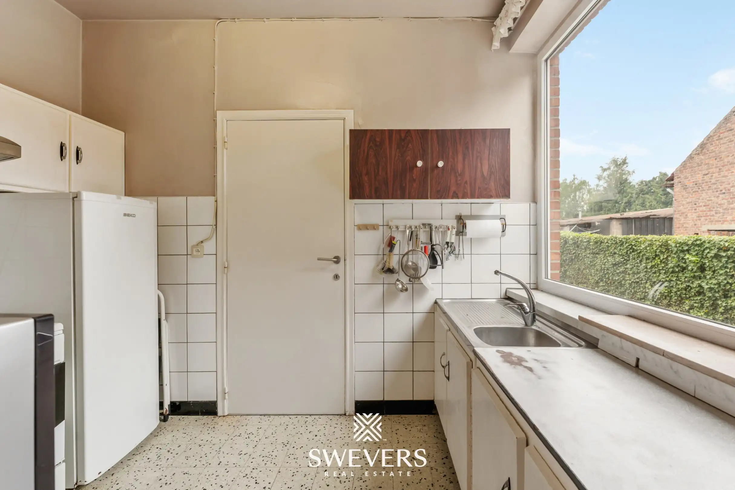 Statige woning met veel potentieel te Hoepertingen foto 12