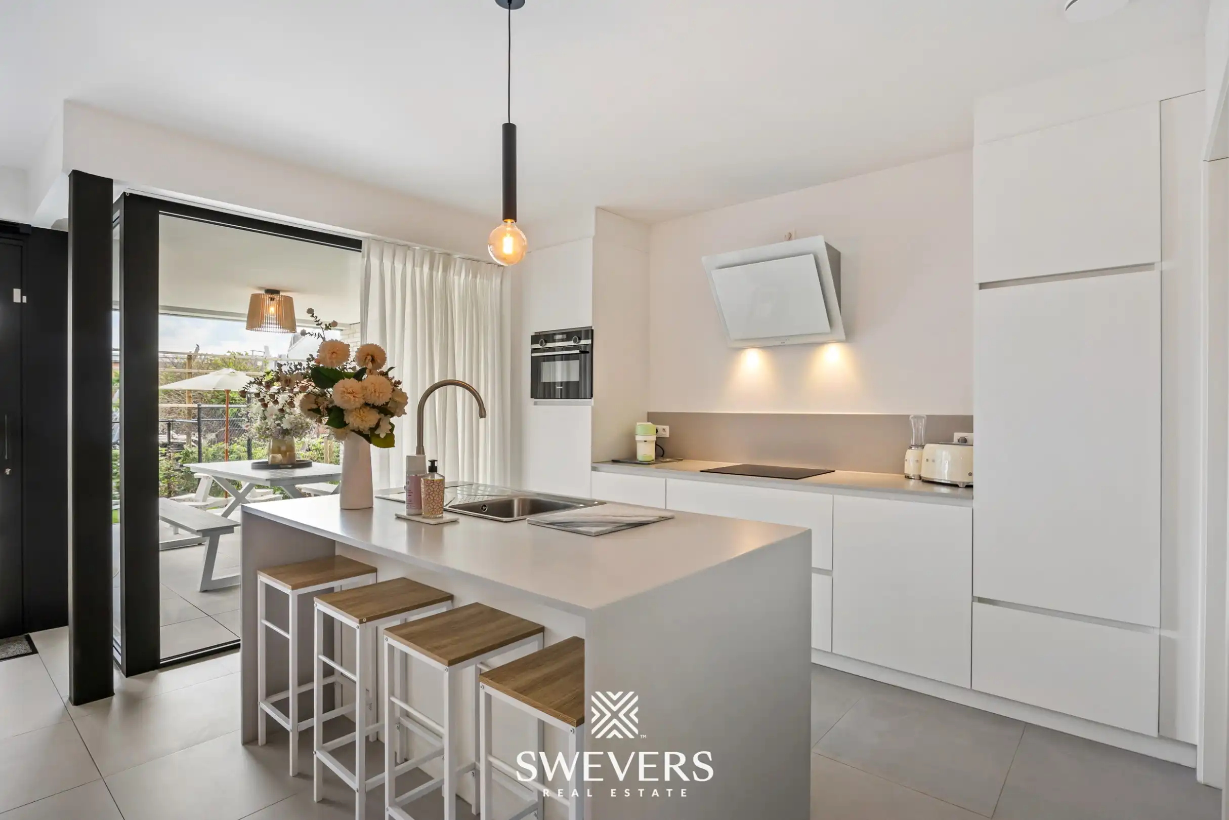 Nieuwbouwappartement met ruim terras, privétuin en ondergrondse staanplaats foto 5