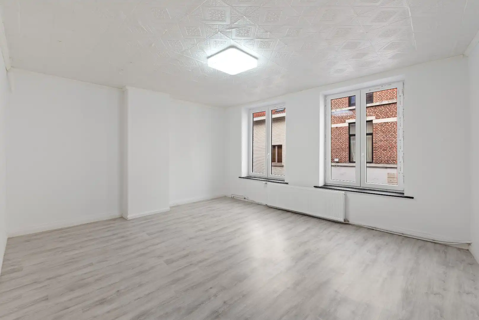 Polyvalente rijwoning met grote handelsruimte te Tienen foto 11