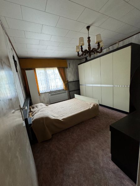 Te renoveren langgevelwoning met veel potentieel op ruim perceel in Herselt foto 16