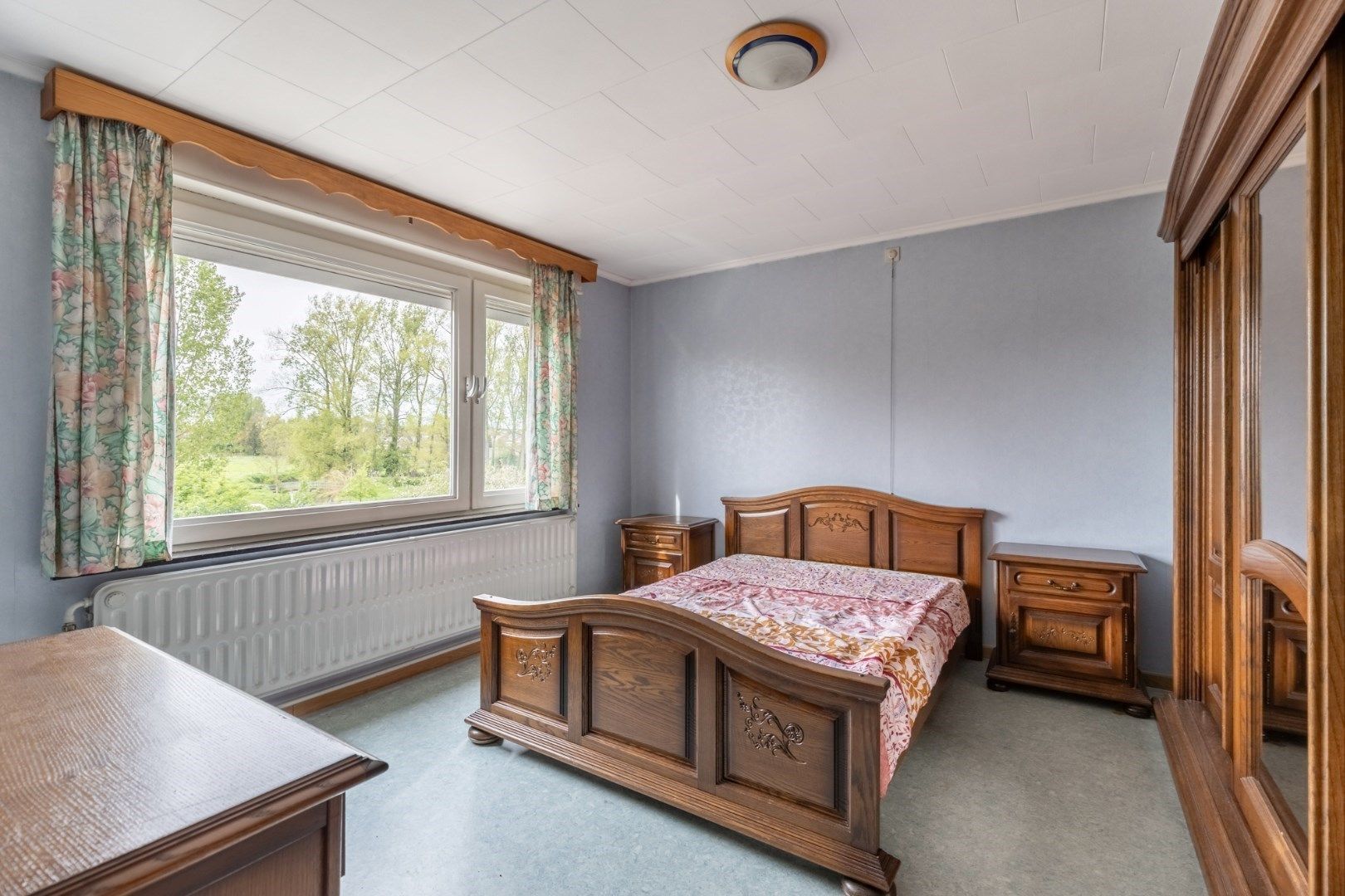 Ruime woning met 4 slaapkamers, garage en diepe tuin met inrit foto 14