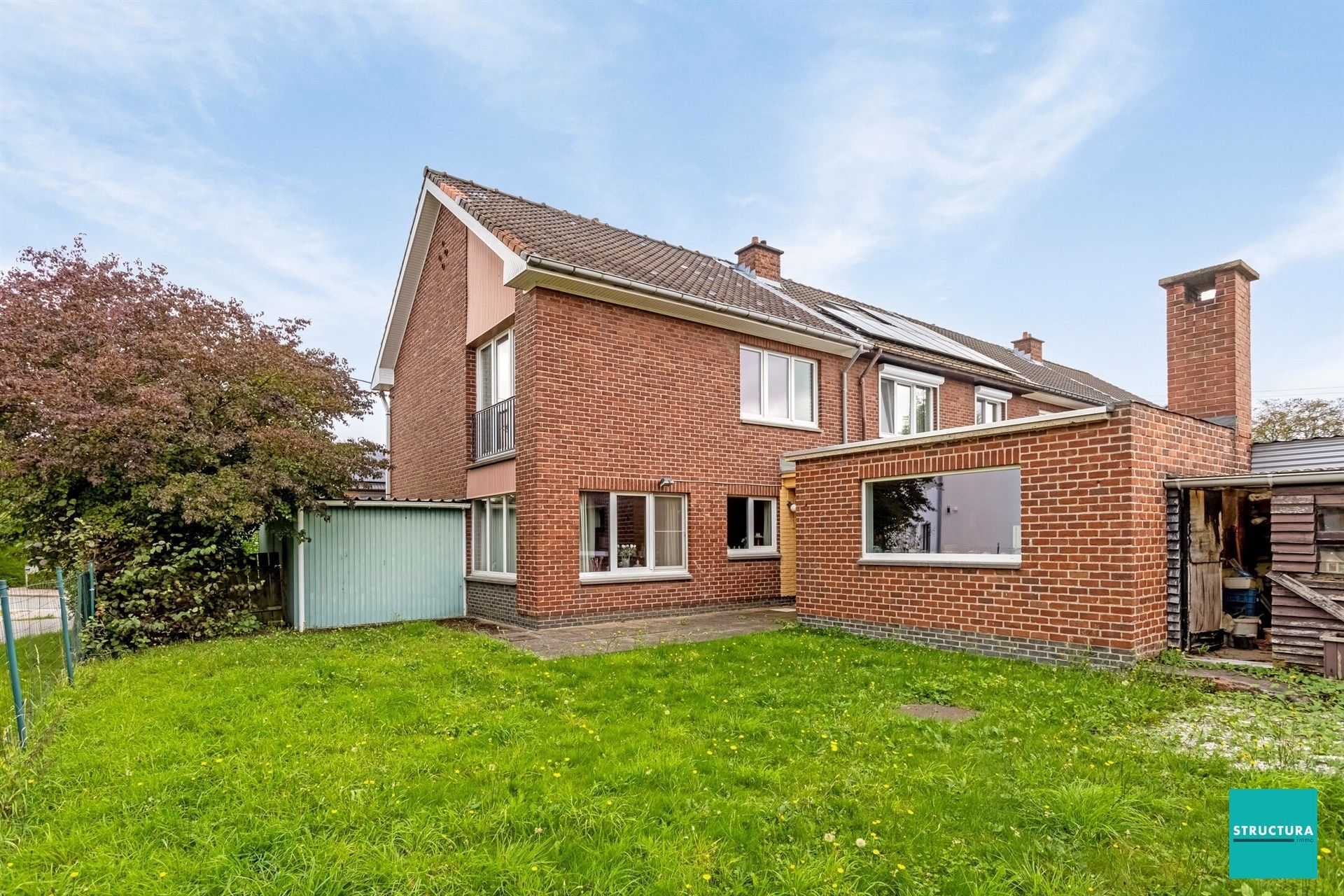 Driegevelwoning met zuid-west tuin in rustige straat foto 2