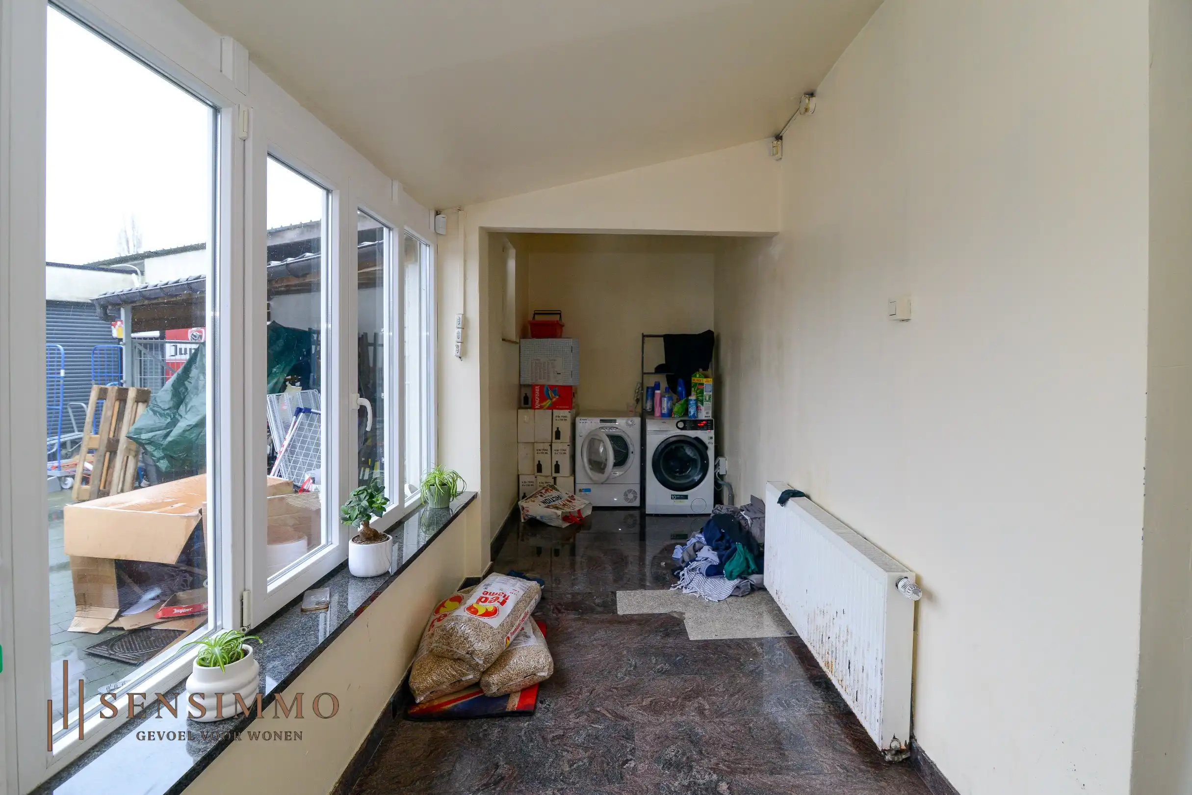 Handelspand met woonst op toplocatie in Dilsen-Stokkem foto 3