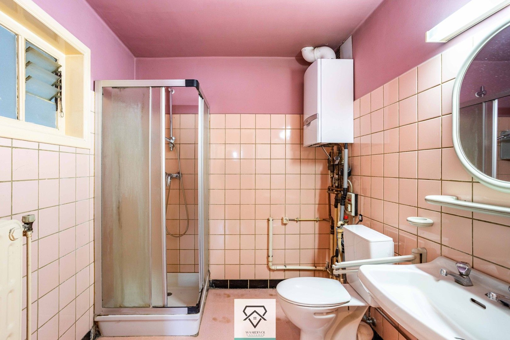 Opbrengsteigendom met 4 appartementen en 2 dubbele garageboxen te koop foto 11