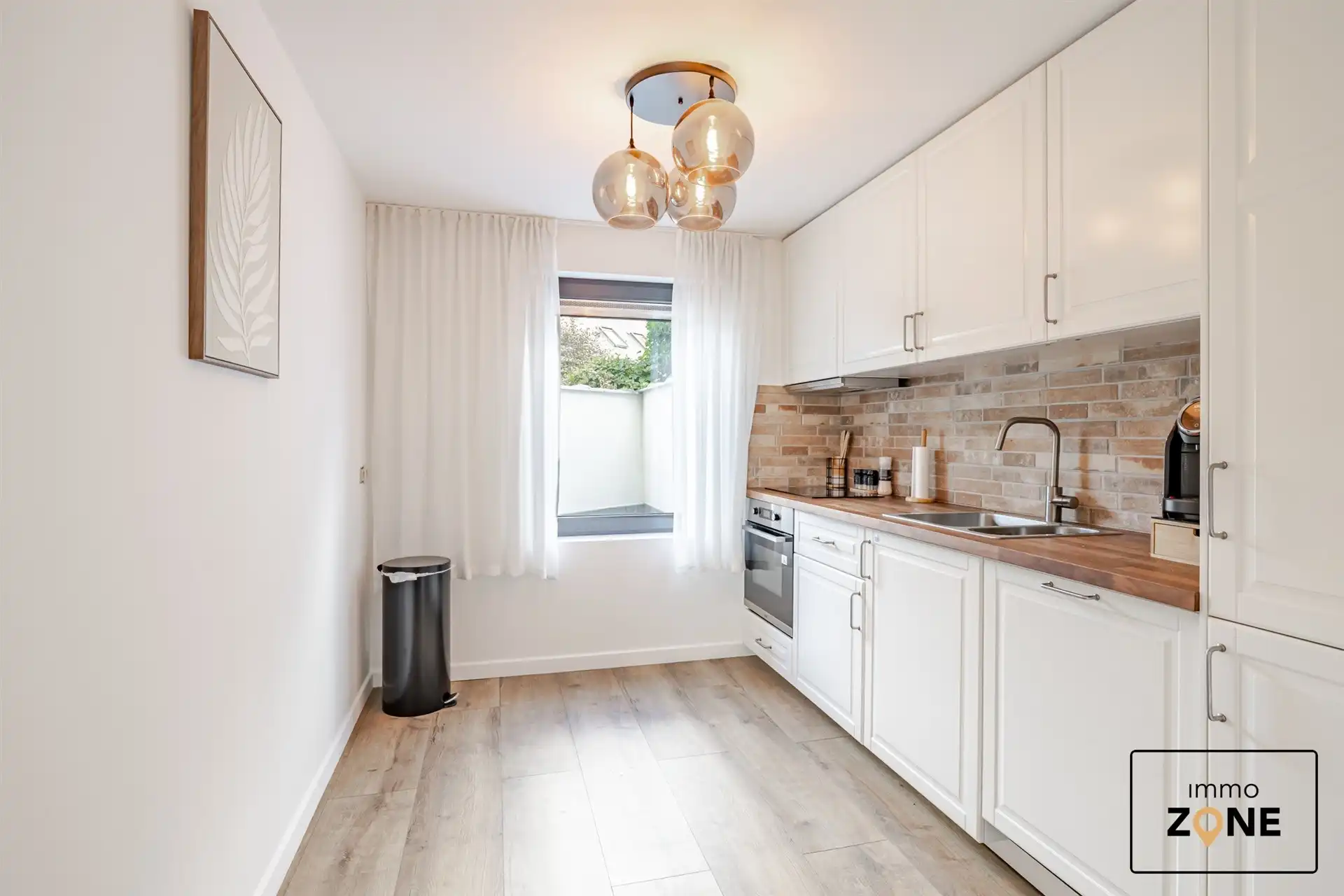 Karaktervolle handelswoning met ruim appartement in Hamme! foto 3