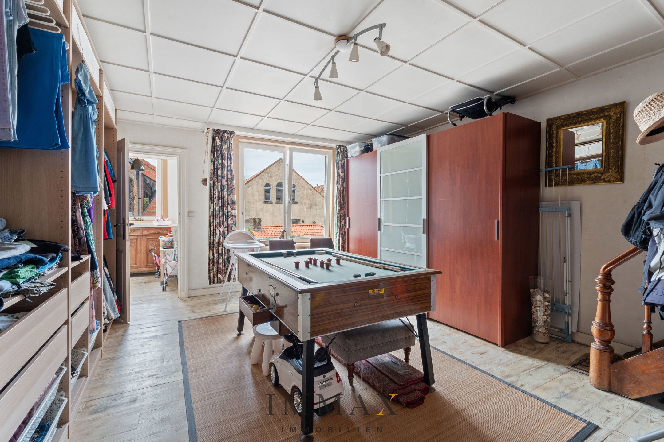 Authentiek handelshuis met handelszaak en ruime etagewoning foto 11