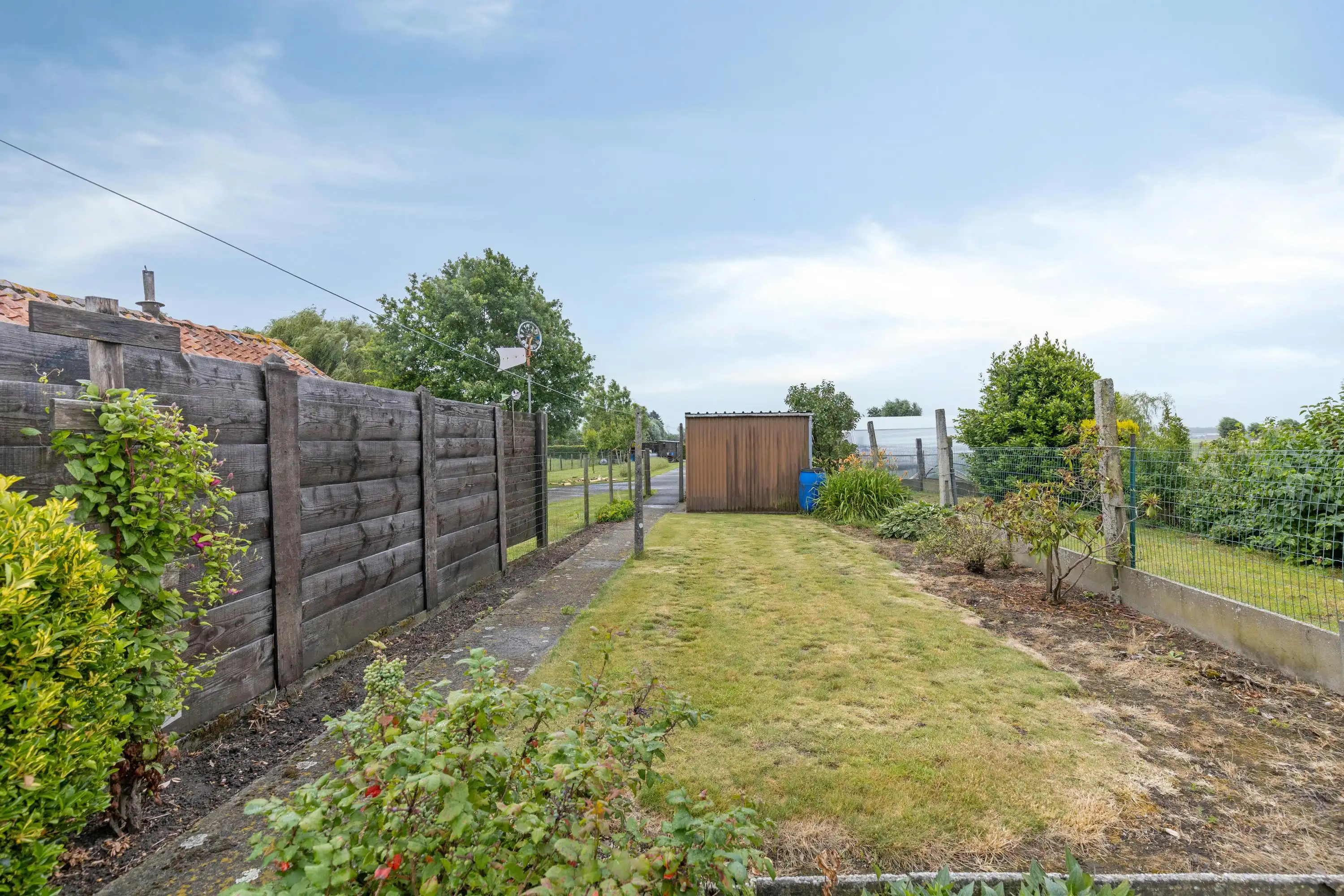 Huis te koop in Woesten met 3 kamers, garage en tuin foto 24