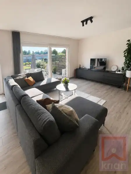 Volledig instapklaar gelijkvloers appartement met 2 slaapkamers, ruime tuin én garagebox foto 5