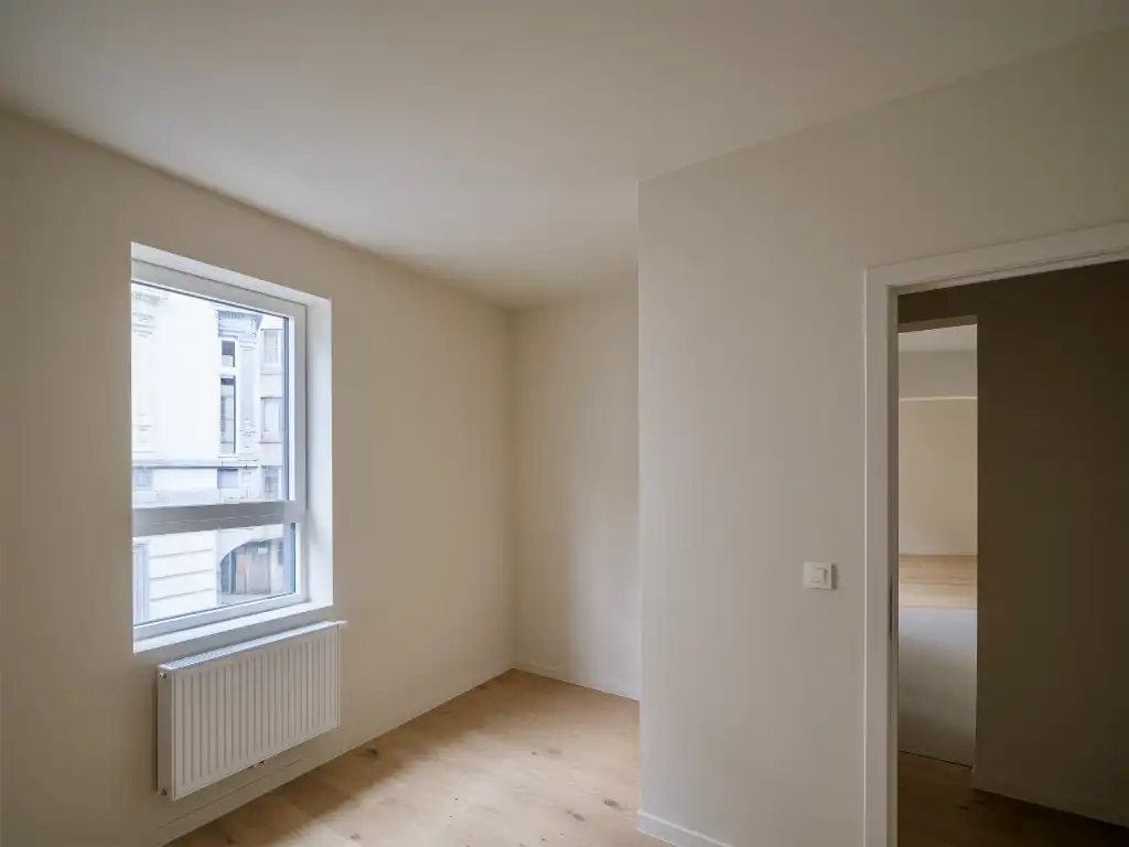 Hoogwaardig gerenoveerd duplex appartement met zonnig terras in het centrum van Gent foto 9