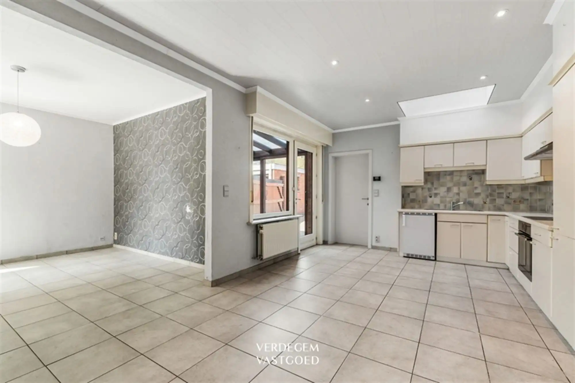 Opbrengsteigendom met 2 appartementen en 4 garages in het centrum van Sleidinge  foto 18