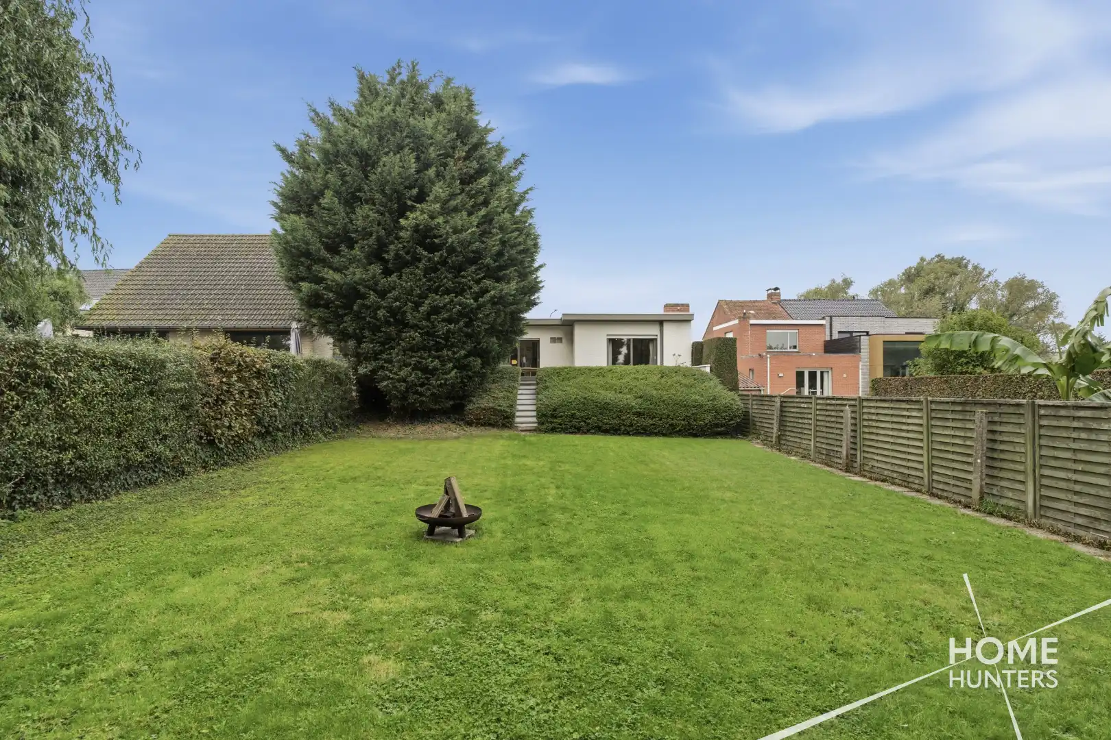 RUSTIG GELEGEN BUNGALOW MET RUIME TUIN EN VEELZIJDIGE KELDERRUIMTE foto 38